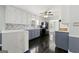 Well-lit kitchen featuring an island, stainless steel appliances, and pendant lighting at 2840 Riverfront Dr, Snellville, GA 30039