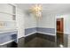 Home office with desk and chair and an open doorway to another room at 2840 Riverfront Dr, Snellville, GA 30039