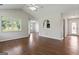 Spacious living area featuring laminate wood floors and lots of natural light at 217 Crystal Ct, Hampton, GA 30228