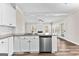 Stylish kitchen featuring stainless steel appliances, granite countertops, and an open floor plan at 821 Hood Rd, Fayetteville, GA 30214