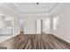 Large main bedroom features hardwood floors and adjoins closet and ensuite bathroom at 821 Hood Rd, Fayetteville, GA 30214