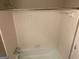 Bathroom featuring a bathtub and tile surround with neutral colors at 6625 Paula Ct, Lithonia, GA 30038