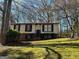 Charming single-Gathering home featuring brick accents and a well-maintained lawn at 6625 Paula Ct, Lithonia, GA 30038