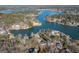 Serene aerial view highlighting lakefront community with docks, homes, and natural beauty at 1278 Heritage Dr, Villa Rica, GA 30180