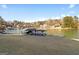 Expansive backyard with view of the lake and boat dock at 1278 Heritage Dr, Villa Rica, GA 30180