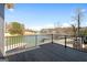 Lake views from the wood-planked balcony of this beautiful home at 1278 Heritage Dr, Villa Rica, GA 30180