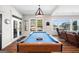 Spacious game room featuring a billiards table and views of the lake at 1278 Heritage Dr, Villa Rica, GA 30180