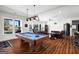 Open concept game room with billiards table and plenty of space for entertaining at 1278 Heritage Dr, Villa Rica, GA 30180