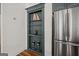 Built-in shelving unit and stainless steel appliances adding style to this modern kitchen at 1278 Heritage Dr, Villa Rica, GA 30180