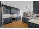 Well-equipped kitchen features granite countertops, stainless steel appliances, and an efficient layout at 1278 Heritage Dr, Villa Rica, GA 30180