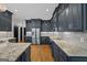 Chef's kitchen is equipped with stainless appliances, granite counters, and plenty of cabinet storage space at 1278 Heritage Dr, Villa Rica, GA 30180