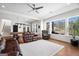 Spacious living room and game room area with plenty of natural light and a lake view at 1278 Heritage Dr, Villa Rica, GA 30180