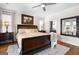 This main bedroom features a comfortable bed and plenty of natural light at 1278 Heritage Dr, Villa Rica, GA 30180