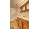 Bathroom with stand up shower, toilet, and vanity at 342 Lakeshore Dr, Stockbridge, GA 30281