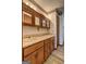 Traditional bathroom features a double sink vanity with wood cabinets and neutral countertops at 342 Lakeshore Dr, Stockbridge, GA 30281