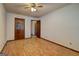 Hardwood bedroom with a closet and an open doorway at 342 Lakeshore Dr, Stockbridge, GA 30281