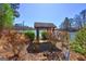 Picturesque lake view featuring a charming gazebo and colorful landscaping, creating a serene waterfront retreat at 342 Lakeshore Dr, Stockbridge, GA 30281