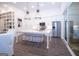 Bright, open kitchen featuring stainless steel appliances, large island with seating, and a sliding glass door to the outside at 170 Fowler St # 200, Woodstock, GA 30188
