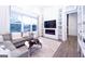 Inviting living room boasts a fireplace, large windows, and stylish decor creating a warm ambiance at 170 Fowler St # 200, Woodstock, GA 30188