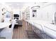 Open-concept living room with modern furnishings and eat-in kitchen at 170 Fowler St # 200, Woodstock, GA 30188