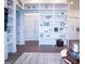 Bright open-concept space offers great built-ins, neutral tones, and hardwood floors perfect for entertaining at 170 Fowler St # 200, Woodstock, GA 30188