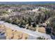 Residential property surrounded by mature trees near local highway at 2218 Young Rd, Stone Mountain, GA 30088