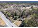 Aerial view of a single-Gathering home near a commercial district and roadway at 2218 Young Rd, Stone Mountain, GA 30088