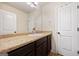 Bathroom features a modern vanity with granite countertop at 312 Maddi Grace Ct, Locust Grove, GA 30248