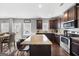 Beautiful kitchen with granite counters, stainless appliances, and large island at 312 Maddi Grace Ct, Locust Grove, GA 30248