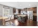 Kitchen with an island, stainless appliances, and granite countertops at 312 Maddi Grace Ct, Locust Grove, GA 30248