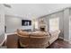 Spacious living room featuring hardwood floors and recessed lighting at 312 Maddi Grace Ct, Locust Grove, GA 30248