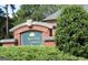 Pristine Forest community sign, with brick surround, and landscaped bushes at 312 Maddi Grace Ct, Locust Grove, GA 30248