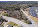 Aerial view of a vacant land parcel with high traffic and visibility near a church at 1849 Panola Rd, Stone Mountain, GA 30088