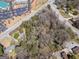 Aerial view of a vacant land parcel near commercial and residential areas at 1849 Panola Rd, Stone Mountain, GA 30088