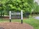 Polo Outdoors community sign, indicates residents only, surrounded by landscaping and an iron fence at 7085 Wakehurst Pl, Cumming, GA 30040