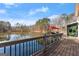 Wide plank deck overlooking the lake with serene lake views at 897 Winding Trl, Lawrenceville, GA 30046