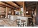 Bright kitchen with stainless steel appliances, granite counters, bar seating, and hardwood flooring at 897 Winding Trl, Lawrenceville, GA 30046
