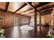 Spacious main bedroom featuring wood paneled walls, beamed ceilings, and lots of natural light at 897 Winding Trl, Lawrenceville, GA 30046