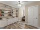 Cozy home office features built-in shelving and wood-look flooring at 897 Winding Trl, Lawrenceville, GA 30046