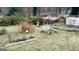 Overhead view of backyard flower garden, mulch, and green grass at 398 Lockridge Ln, Lawrenceville, GA 30046