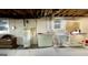 Unfinished basement with utilities and natural light at 398 Lockridge Ln, Lawrenceville, GA 30046