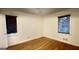 Bedroom with hardwood floors, windows, and great light at 398 Lockridge Ln, Lawrenceville, GA 30046