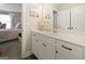 Bright bathroom with a white vanity and sleek hardware, next to the bedroom at 830 Turner Rd, Mcdonough, GA 30252