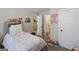 Bright bedroom with a princess theme, a decorative vanity mirror, and a bathroom at 830 Turner Rd, Mcdonough, GA 30252
