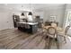Spacious eat-in kitchen featuring modern appliances, a center island, and coordinating table and chairs at 830 Turner Rd, Mcdonough, GA 30252