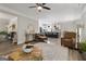 View of living area into eat-in kitchen, featuring seating and kitchen island with pendant lights at 830 Turner Rd, Mcdonough, GA 30252