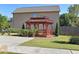 Well-maintained backyard with a red gazebo and green lawn beside the house at 2478 Oakleaf Rdg, Lithonia, GA 30058