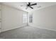 Neutral bedroom with ceiling fan and carpet at 992 Bay Pointe Sw Way, Lilburn, GA 30047