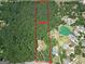 Aerial view of 6.07 acre property with boundaries in a wooded area at 133 Harold Dr, Mcdonough, GA 30253
