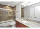 Bathroom featuring granite countertops, a glass-enclosed shower, and modern fixtures at 133 Harold Dr, Mcdonough, GA 30253